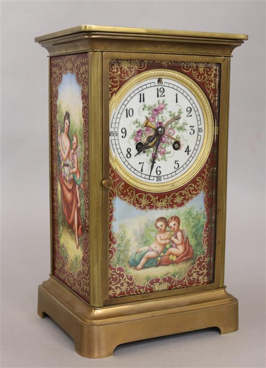 A porcelain four panel clock height 28cm